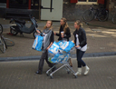 Girls with shopping cart